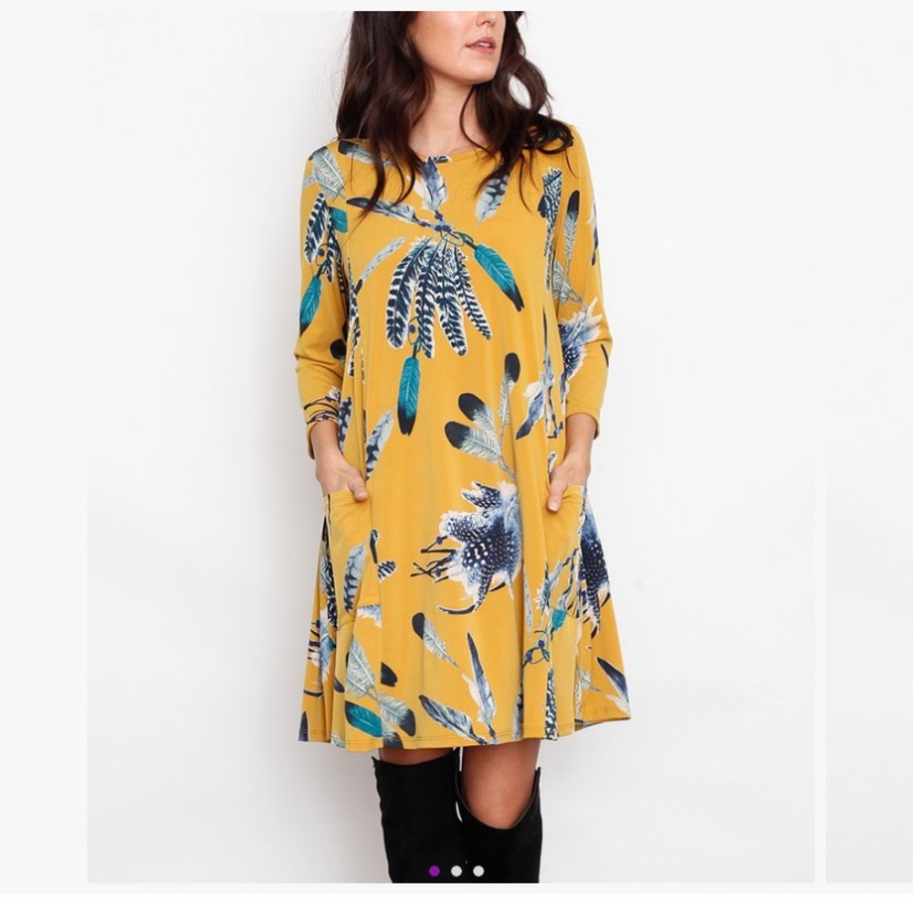 Mustard swing dress size small- feather print
